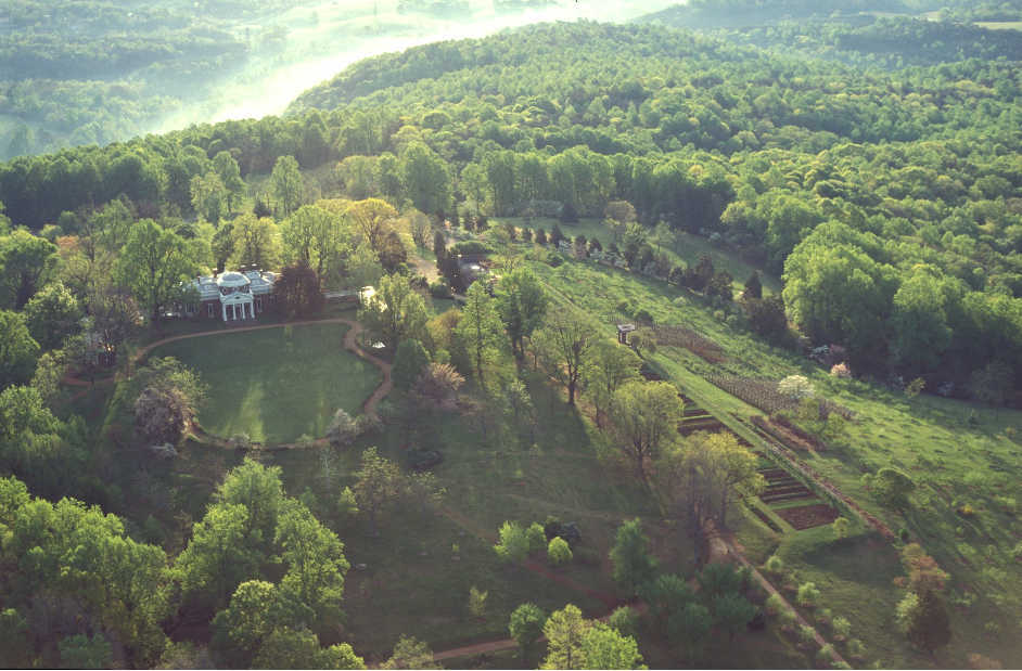Jefferson built his  iconic neo-classical mansion  at the summit of a small mountain on the western edge of his 5000-acre Monticello Plantation tract.  The eastern slopes of the mountain are today covered in forest, but in Jefferson&rsquo;s day would have been cleared for agricultural fields and dotted with the houses of enslaved laborers.  NEH has provided funding of archaeological research to rediscover this vanished plantation landscape. Image courtesy of Monticello.