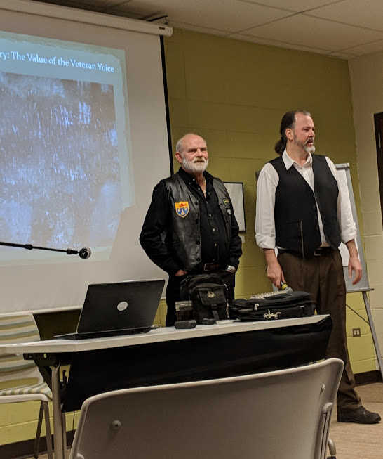 Project Co-Director Todd Culp introduces DePaul University Professor and Vietnam War veteran James Brask&rsquo;s public talk entitled &ldquo;The Value of the Veteran Voice.&rdquo; Photo courtesy of Mark Waters.